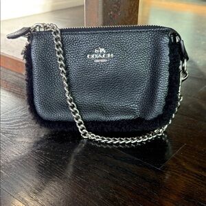 Coach Nolita Black Pebbled Leather Mini Chain Wristlet with Shearling Trim